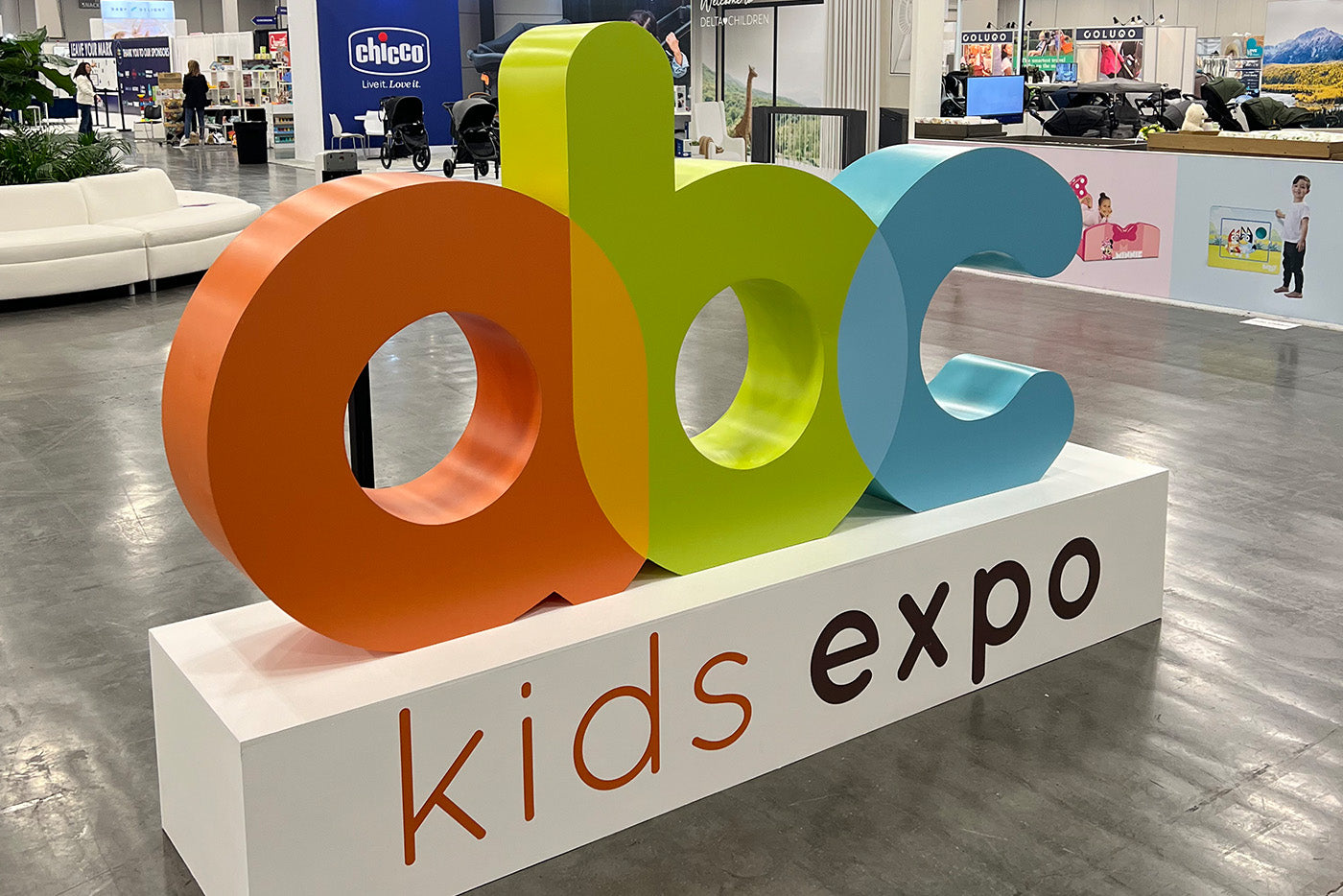 Quark Baby colorful booth display at ABC Kids Expo trade show in Las Vegas.
