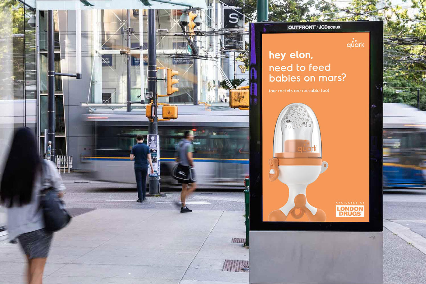 Quark Baby bottle featured in orange street advertisement campaign in Vancouver.