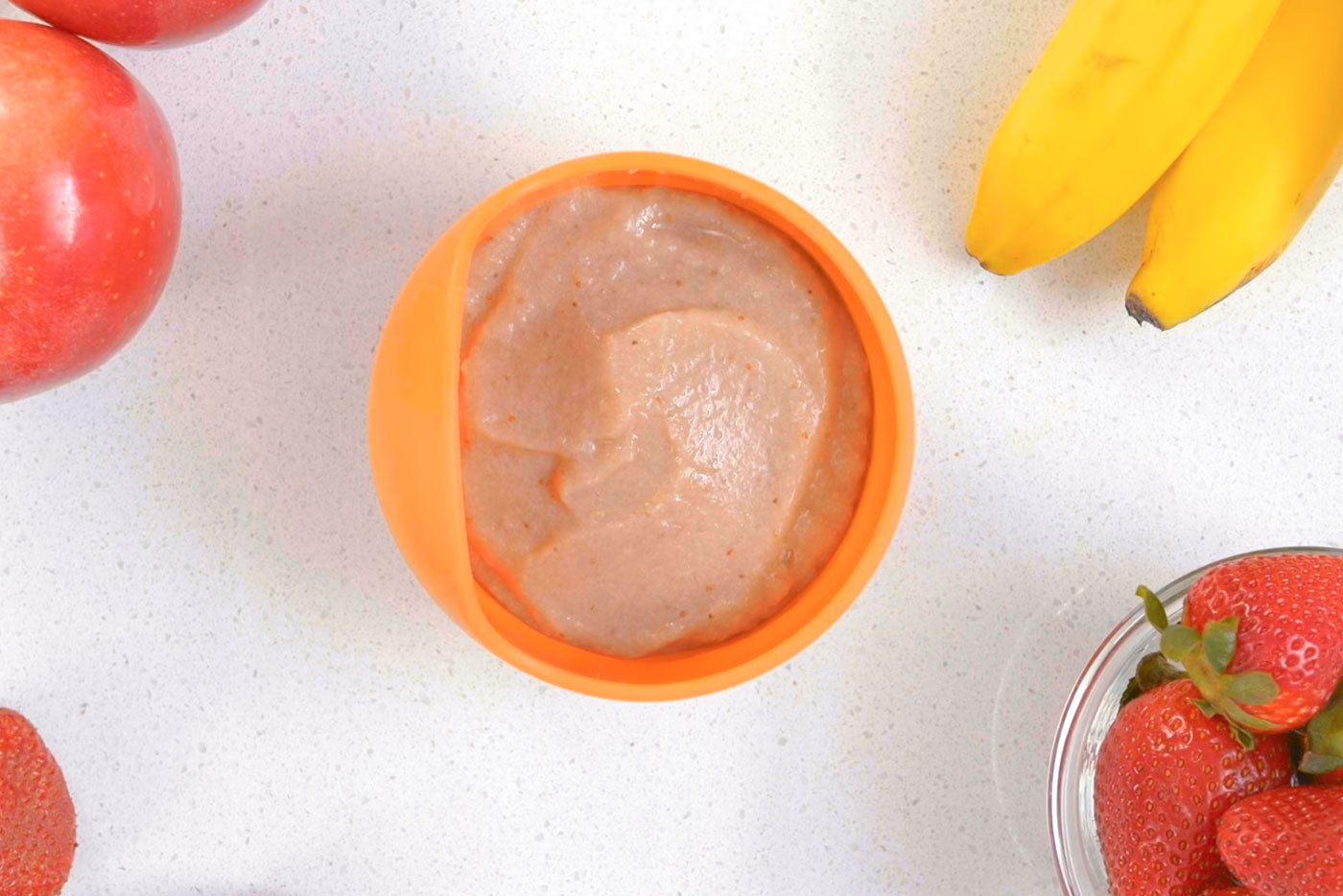 Quark Baby Quook baby food processor with strawberry banana apple purée recipe.