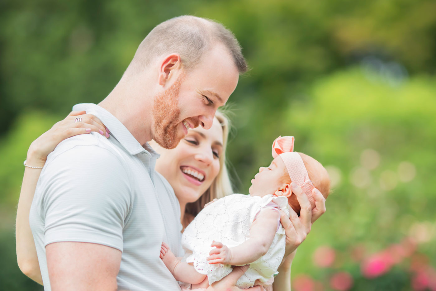 Happy family with infant outdoors, Quark Baby lifestyle portrait