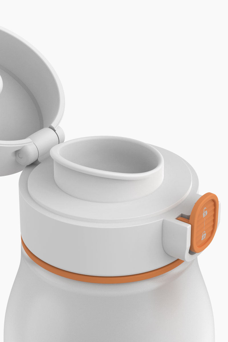 BuubiBottle portable milk warmer cap open showing stainless steel heating vessel — even milk warming for breast milk and formula, BPA-free