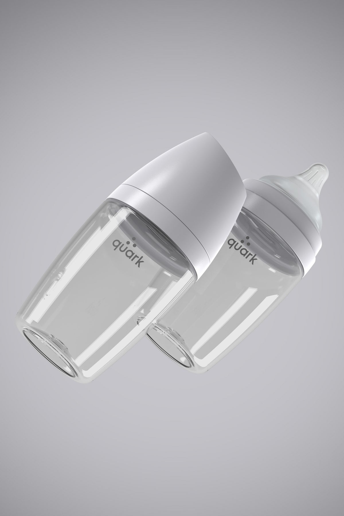 Two BuubiBottle Max 8oz grey baby bottles angled on neutral background — lightweight shatterproof feeding bottles for older babies