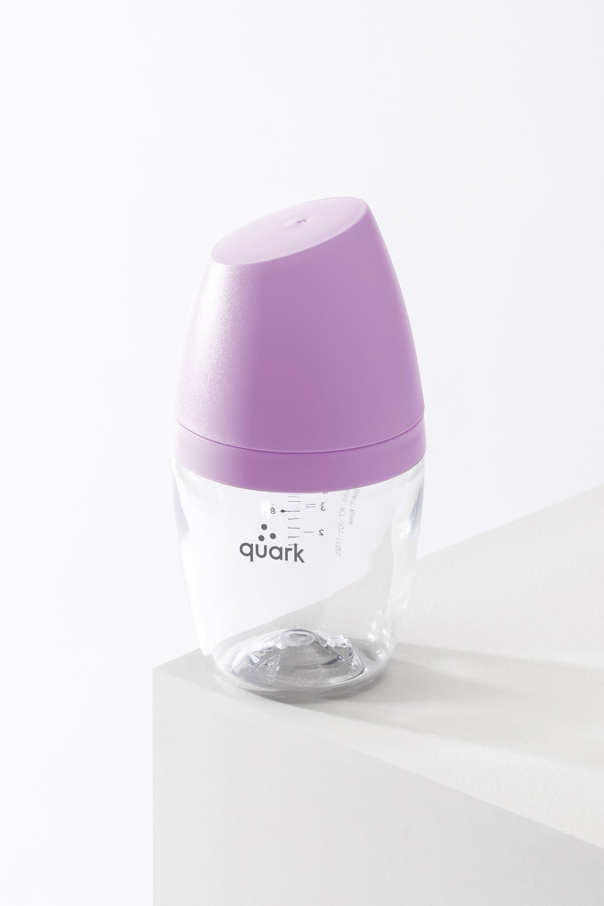 Quark BuubiBottle Mini purple hybrid feeding bottle with measurement markings