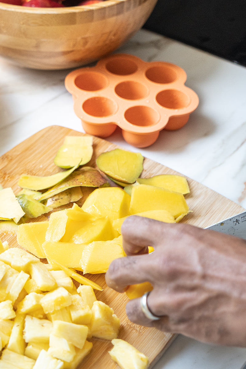 Quark Chiill silicone freezer tray with diced potatoes during meal prep on cutting board